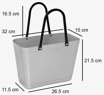 Bild av stilren väska i gammelrosa med svarta handtag