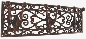 Bild av elegant järnredskapshållare med tre krokar