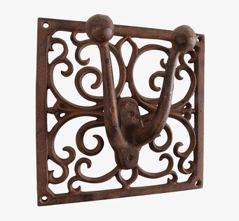 Foto av gedigen och stilren redskapshållare i järn