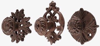 Bild av tre unika dörrknoppar med intrikata mönster