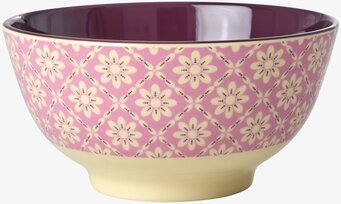 Bild av skål med grafiskt blommönster och plommonfärg