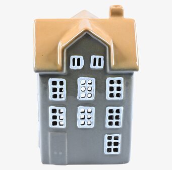 Bild av dekorativ ljuslykta med husinspirerad design