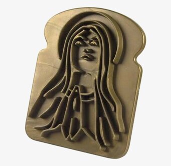 Bild av en kreativ brödstämpel för dekorativa mönster