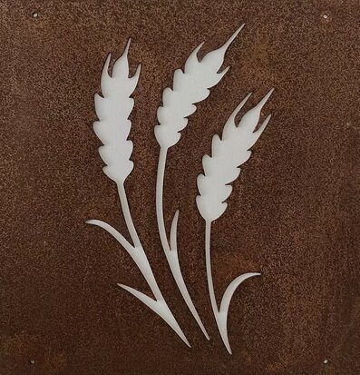 Bild av dekorativ skylt med stiliserade veteax