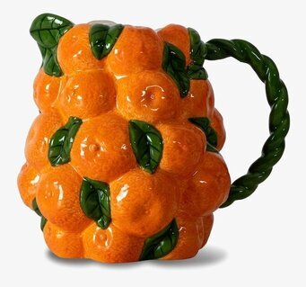 Bild av färgstark kanna med citrusfrukter-design