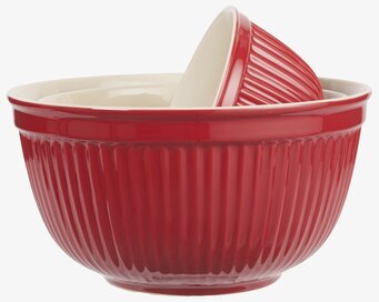 Foto av elegant skålset i rött med krämvit insida