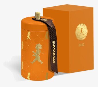 Bild av modernt tändsticksrör med orange design