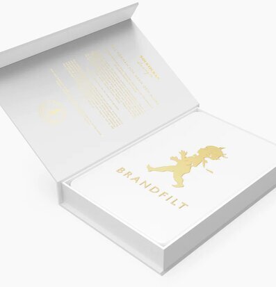 Bild av elegant och funktionell brandfilt i vit/guld