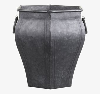 Foto av robust zinkkruka med handtag och patina