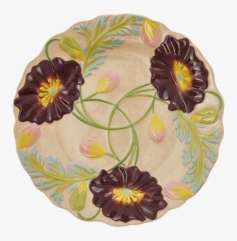 Bild av kreativt designad keramikassiett med blommor