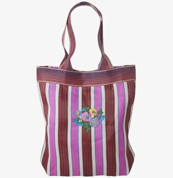 Bild av färgstark shoppingväska med blommigt broderi