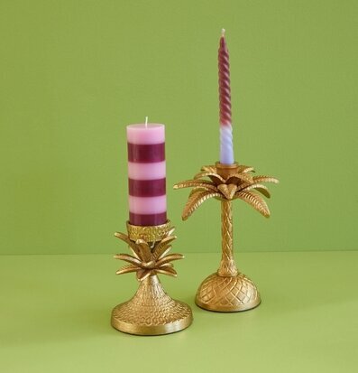 Bild av eleganta ljusstakar med palminspiration