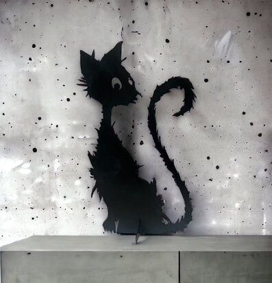 Foto av konstnärlig kattsiluett mot betongvägg