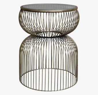 Foto av elegant runt glasbord med mässingsdetaljer