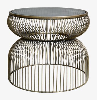 Foto av glasbord med mässingsram och geometrisk design