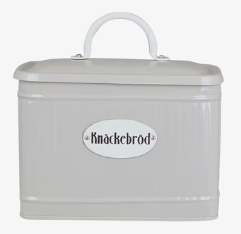 Foto av beige plåtburk för knäckebröd med retrostil
