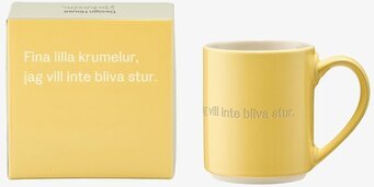Bild av gul mugg med Astrid Lindgren-citat