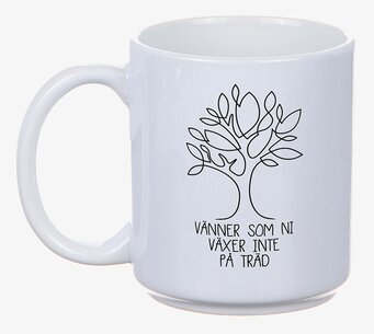 Foto av vit mugg med trädillustration och text