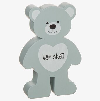 Bild av dekorativ nallebjörn med hjärta och text