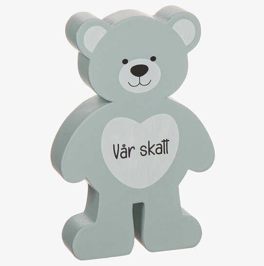 Bild av dekorativ nallebjörn med hjärta och text