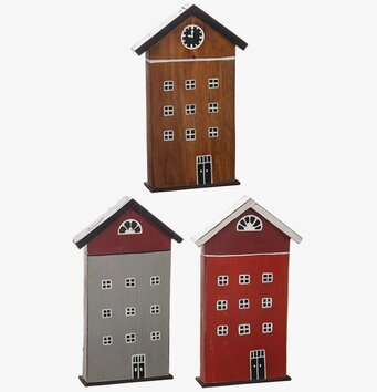 Bild av tre charmiga dekorativa trähus i olika färger