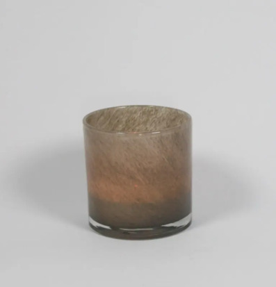 Bild av ljuslykta i mullvadsbrunt glas och textur