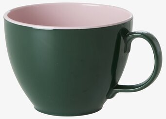 Bild av färgglad mugg med grön utsida och rosa insida