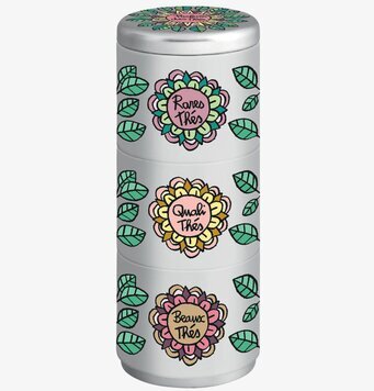 Bild av stilren och färgglad plåtburk för teförvaring