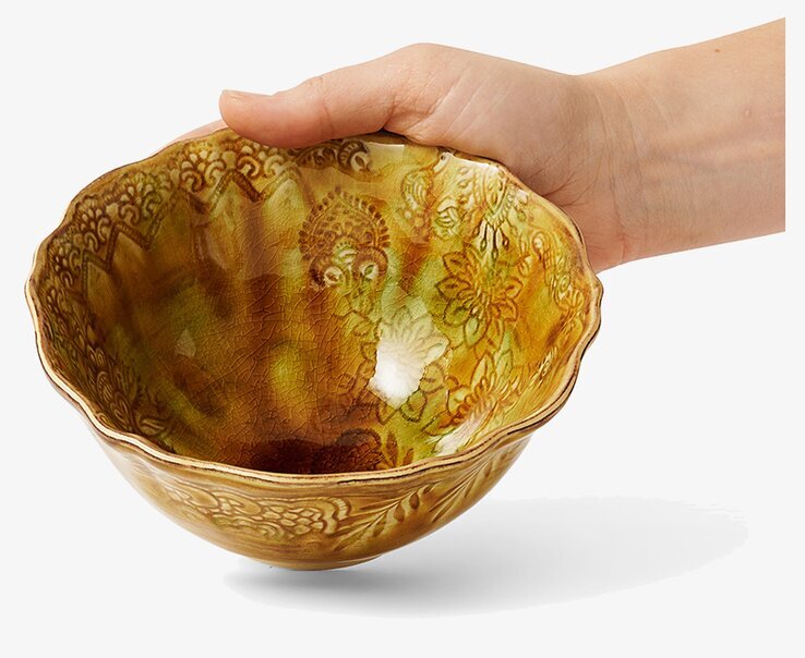 Foto av elegant skål med arabeskmönster och ananas