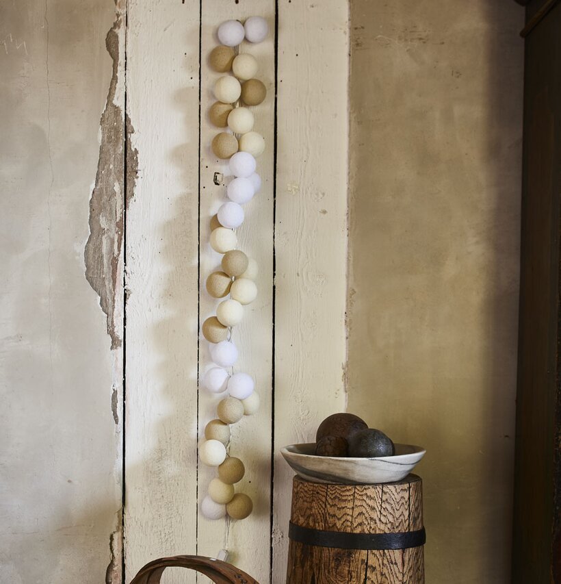 Ljusslinga Happy Lights - Kandi från Happy Lights på trävägg