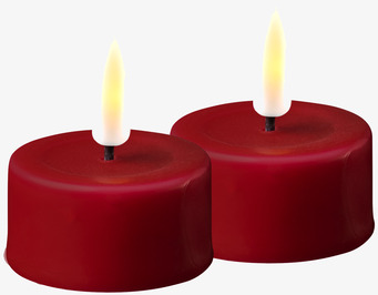 Bild av stilrena LED-värmeljus i bordeauxfärg