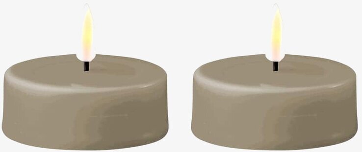 Bild av eleganta LED-värmeljus med realistisk flamma