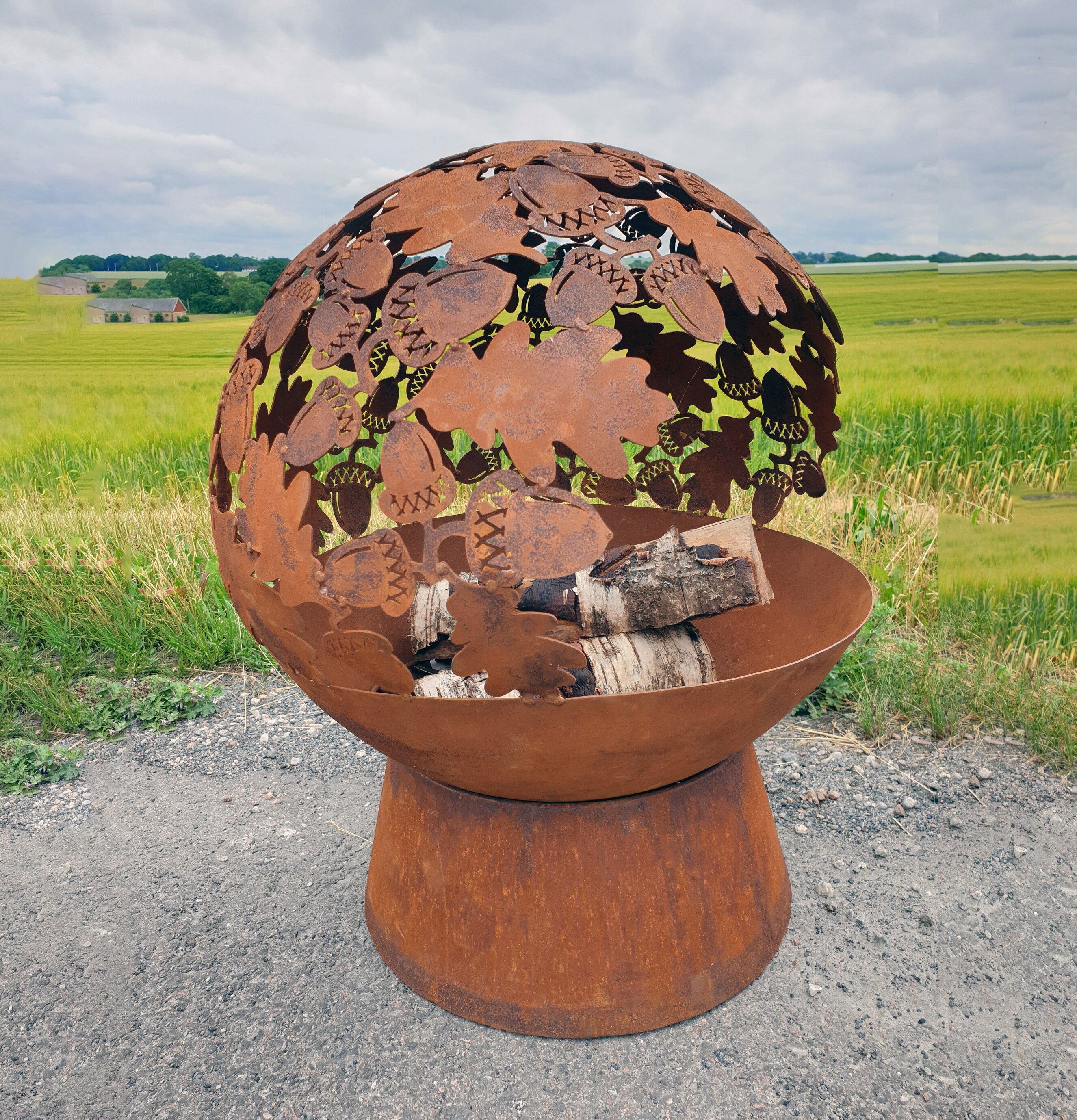 Eldklot Rost från Västanvinden med detaljerat lövmönster