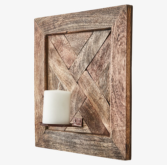 Bild av rustik väggljushållare med trä och metall