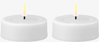 Bild av två realistiska LED-värmeljus i vit design