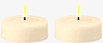Bild av stora LED-värmeljus med krämfärgad yta