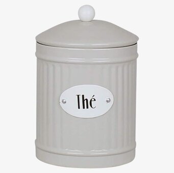 Bild av elegant beige plåtburk för teförvaring