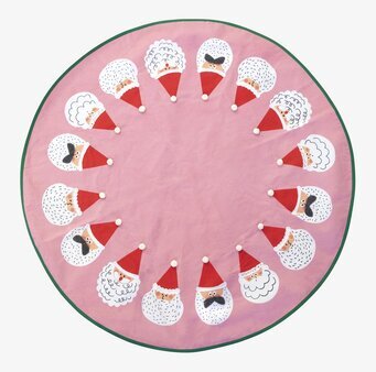 Bild av rosa julgransmatta med tomtar och grön kant