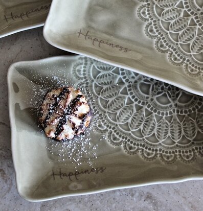 Bild av eleganta rektangulära fat med spetsmönster