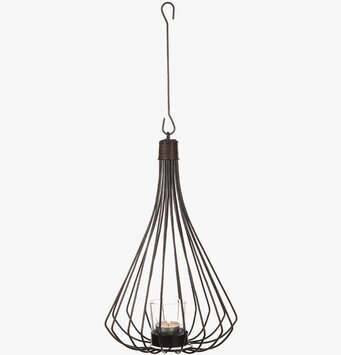 Foto av elegant ljuslykta med unik och luftig design