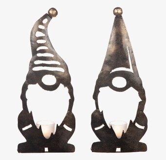 Bild av stiliserade tomtelyktor i hamrad plåt