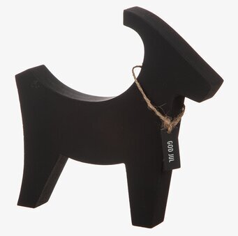 Bild av stilren svart julbock i trä med God Jul-etikett