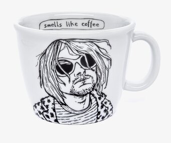 Foto av porslinsmugg med konstnärlig design