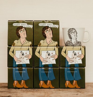 Bild av humoristisk kaffemugg med tecknad design