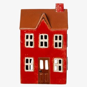 Bild av charmig ljuslykta i form av ett rött hus