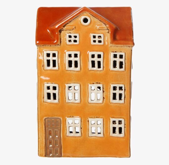 Foto av dekorativ ljuslykta formad som ett gult hus