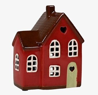 Bild av charmig ljuslykta i form av ett rött hus