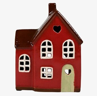 Bild av charmig ljuslykta i form av ett rött hus