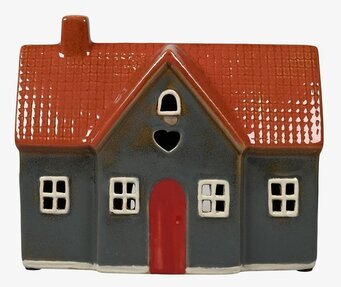 Bild av charmig ljuslykta utformad som ett hus