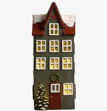 Bild av dekorativt hus med LED-belysning och snödetaljer